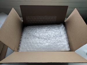 MacBook packed for safe shipping